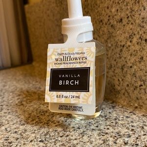 Bath and BodyWorks brand room fragrance-wallflower refill bottle.